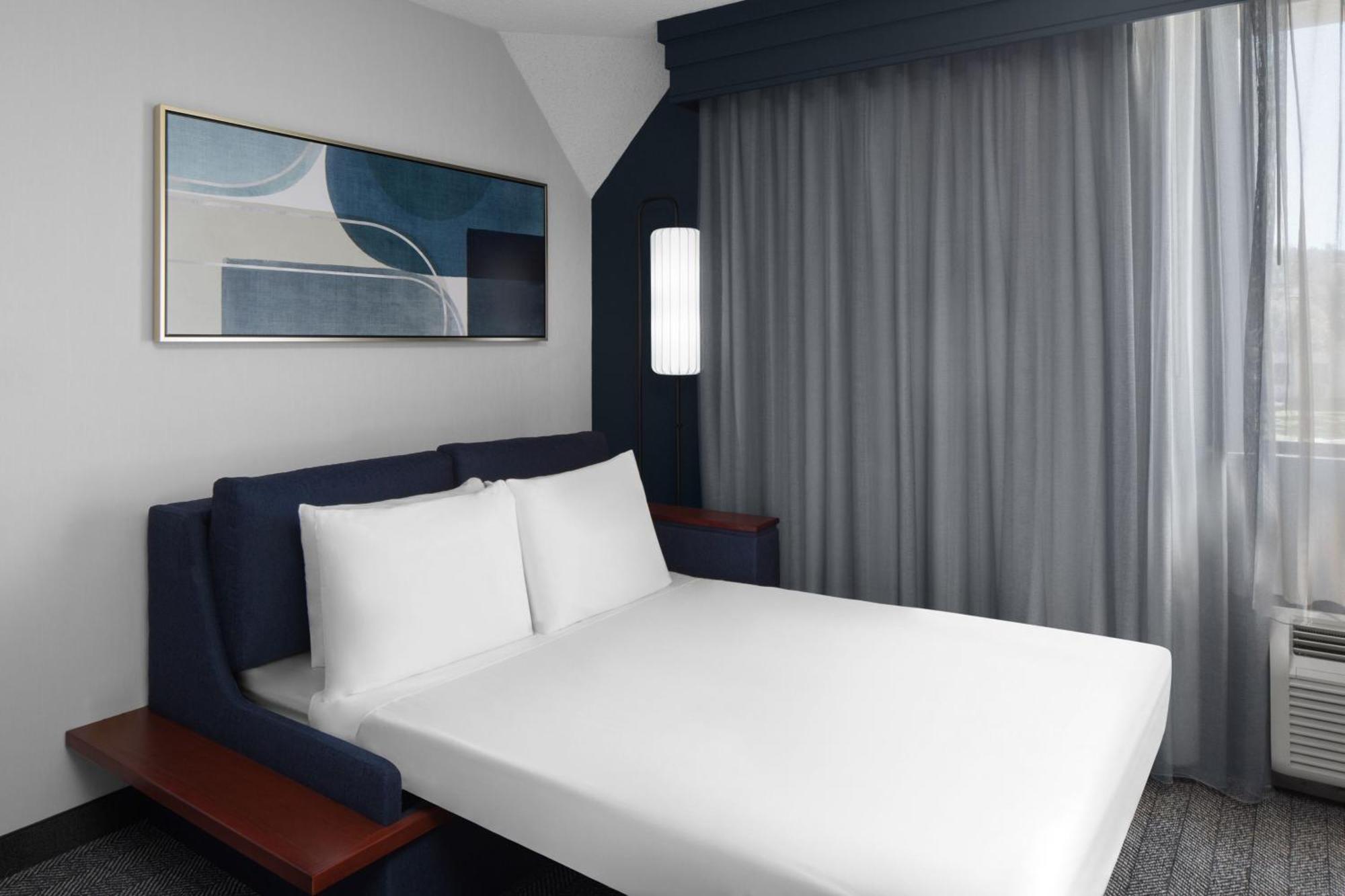 One-Bedroom King Suite with Courtyard View and Sofa Bed